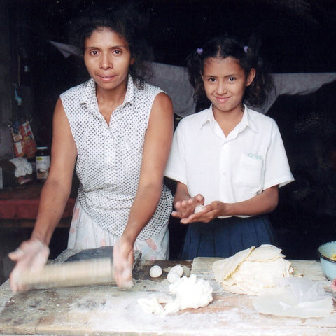 Give a gift that matters: a donation in your friend's name. With a $25 loan, a Honduran mother can sell more tortillas, increase her profit and keep her childre